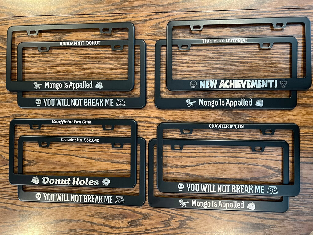 Four DCC license plate frame designs