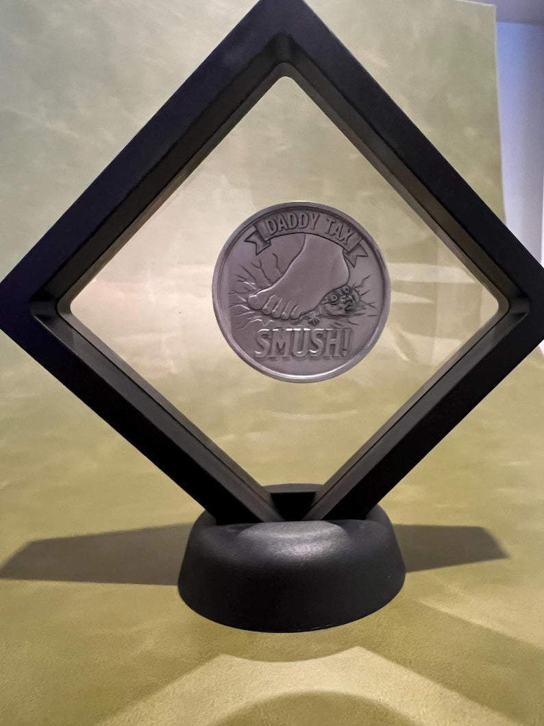 Floating coin display case with Daddy Tax coin