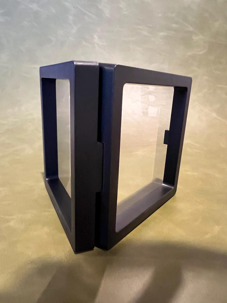 Display case open showing clear panels